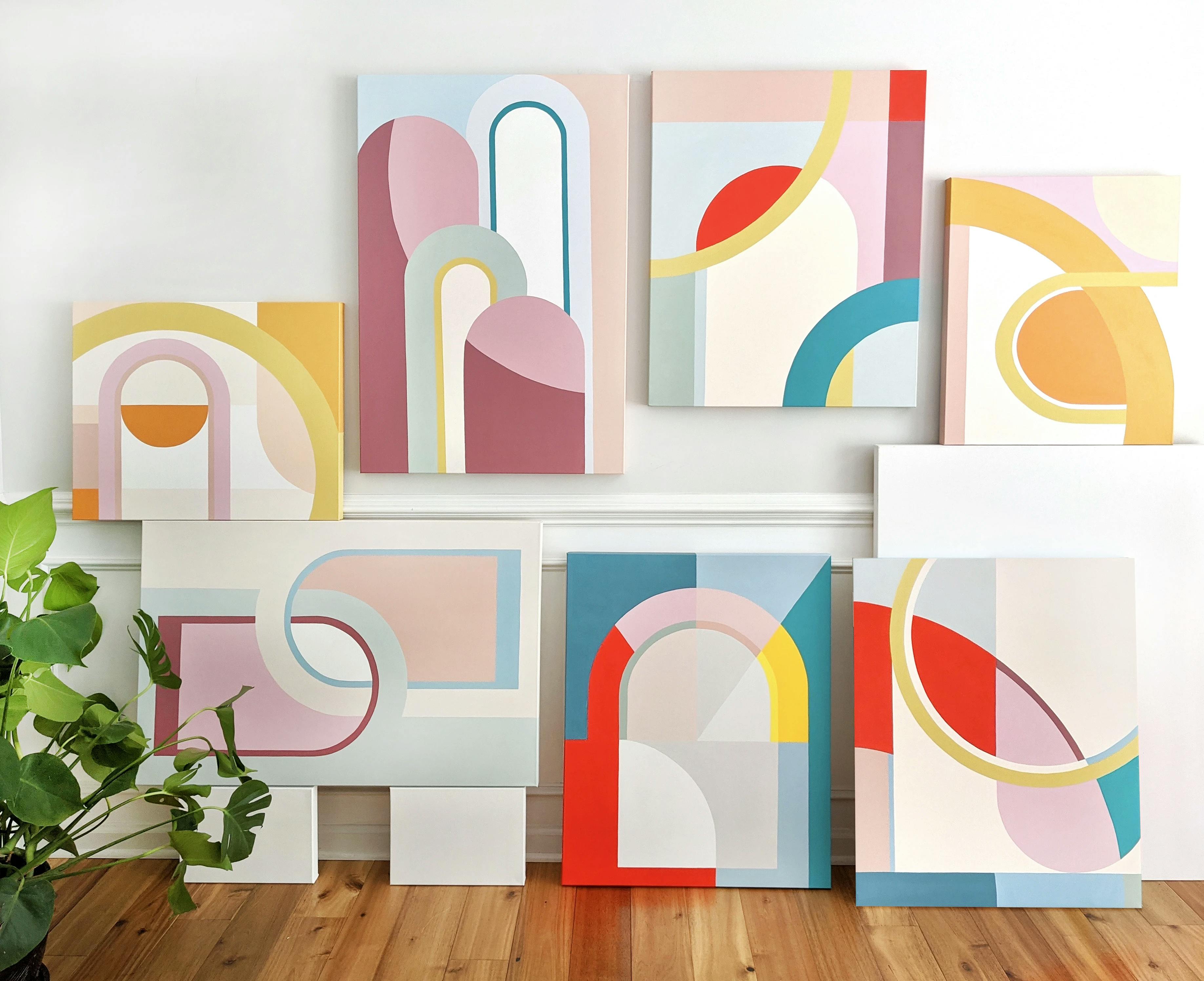 Colorful, architectural paintings by artist Christina Flowers in her studio.