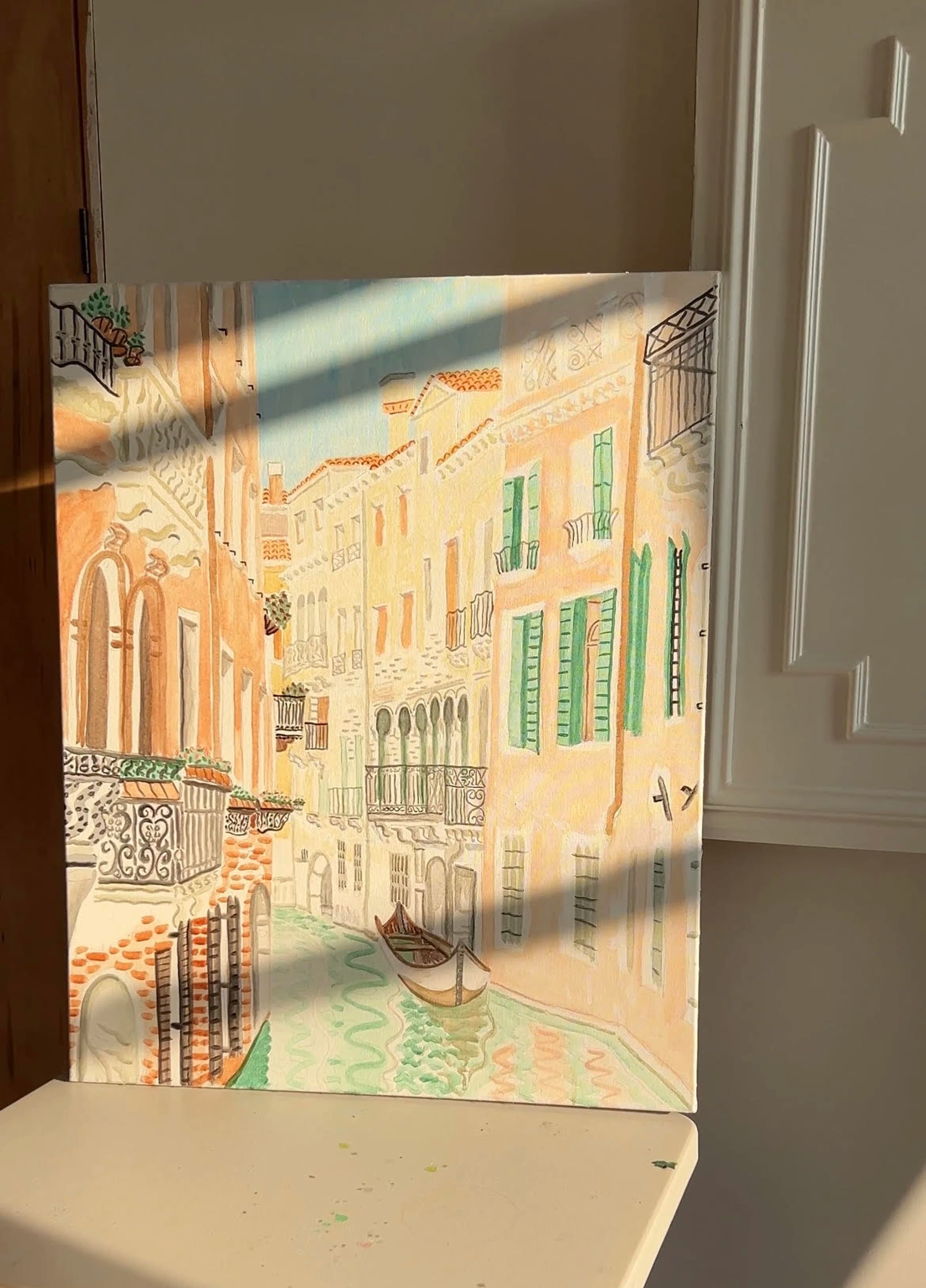 A watercolor painting of the Venice canals by artist David Rhoads in his studio.